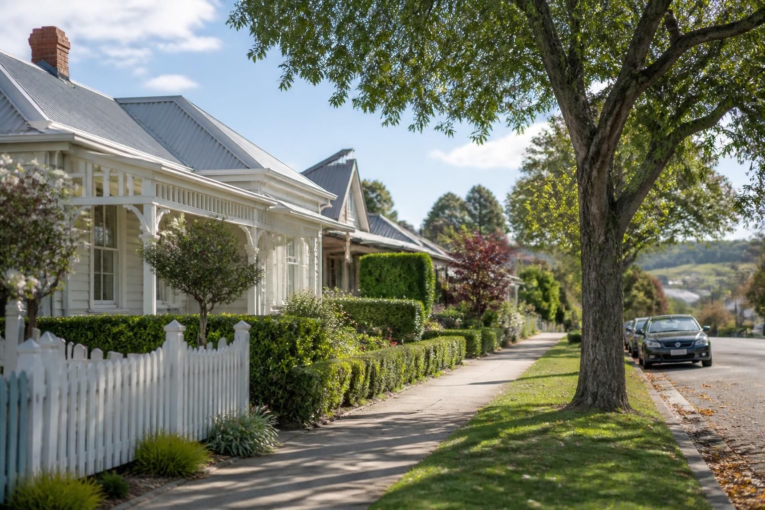 Tidy suburban street with homes and trees in Warragul.